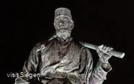 Henner - Bronzestatue des Bergmanns auf der Siegbrücke